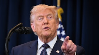 Donald Trump points while speaking