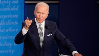 Joe Biden points his finger and speaks angrily at a presidential debate.