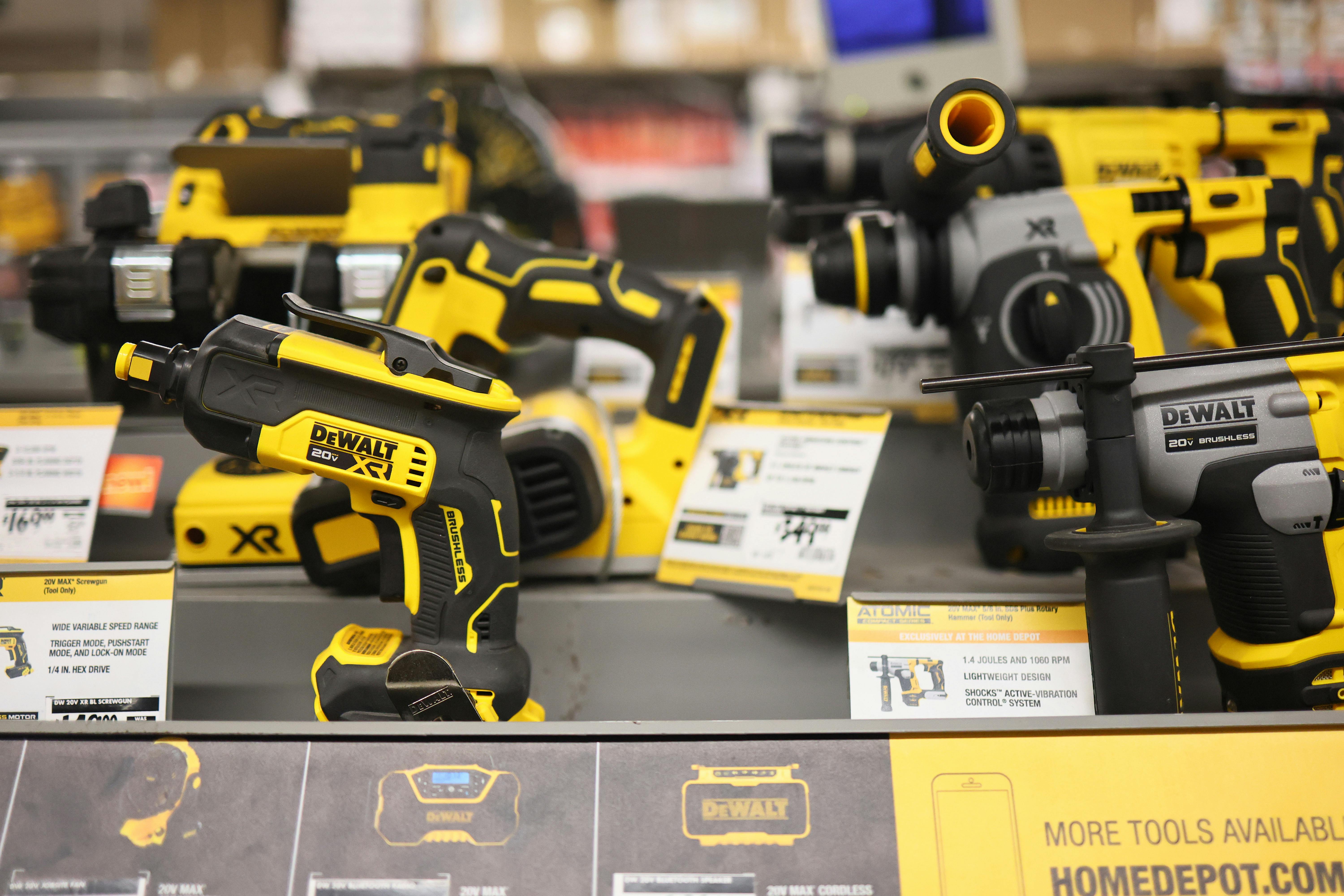 DeWalt power tools are displayed at a Home Depot on May 2, in New York City. Stanley Black & Decker, the parent company of DeWalt and Craftsman, announced price increases across its tool lineup, citing expected supply chain disruptions and production costs linked to new tariffs imposed by the Trump administration. 
