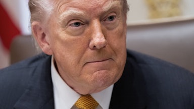 Donald Trump presses his lips together