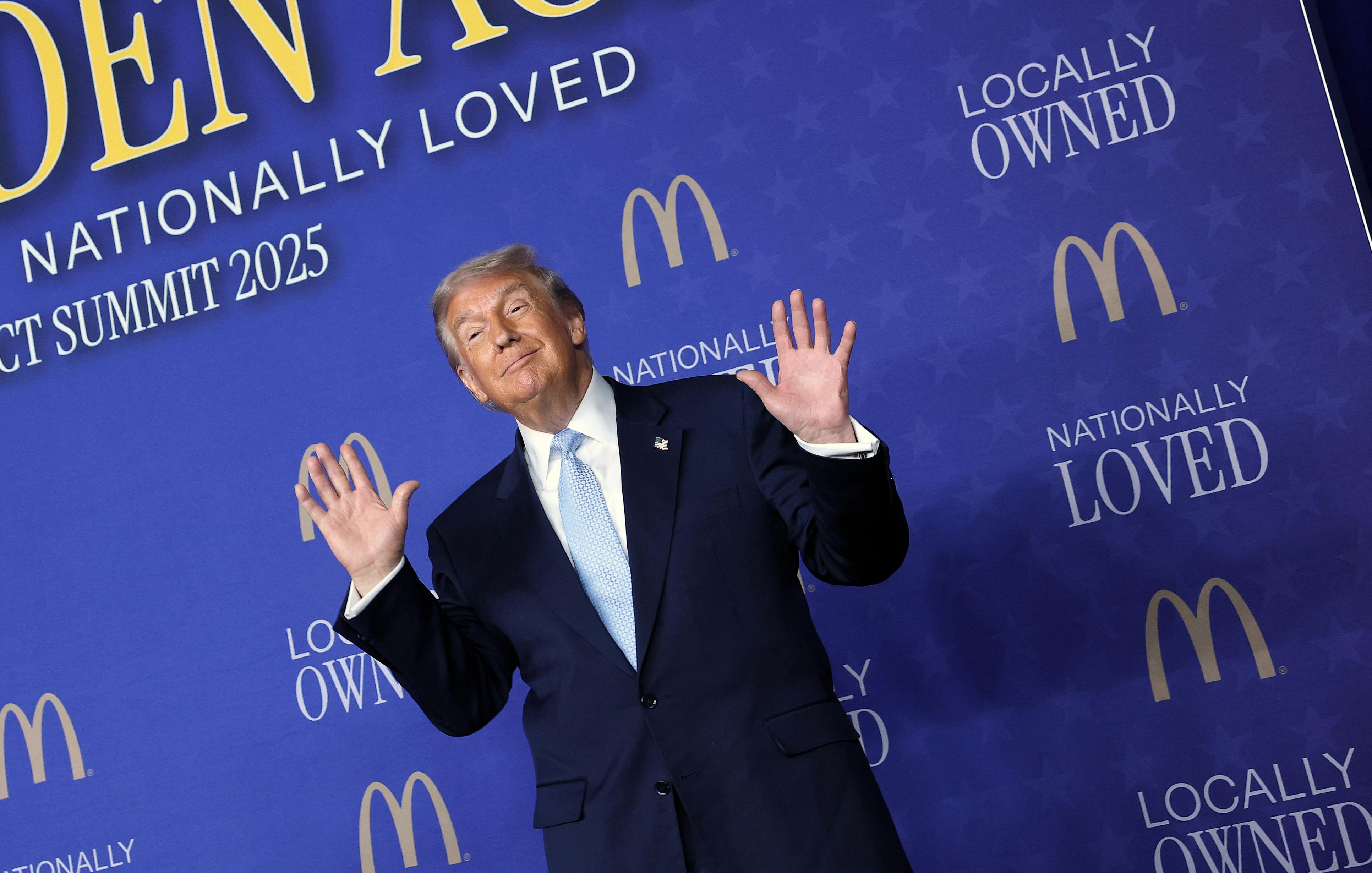 Donald Trump arrives to deliver remarks at the McDonald’s Impact Summit.