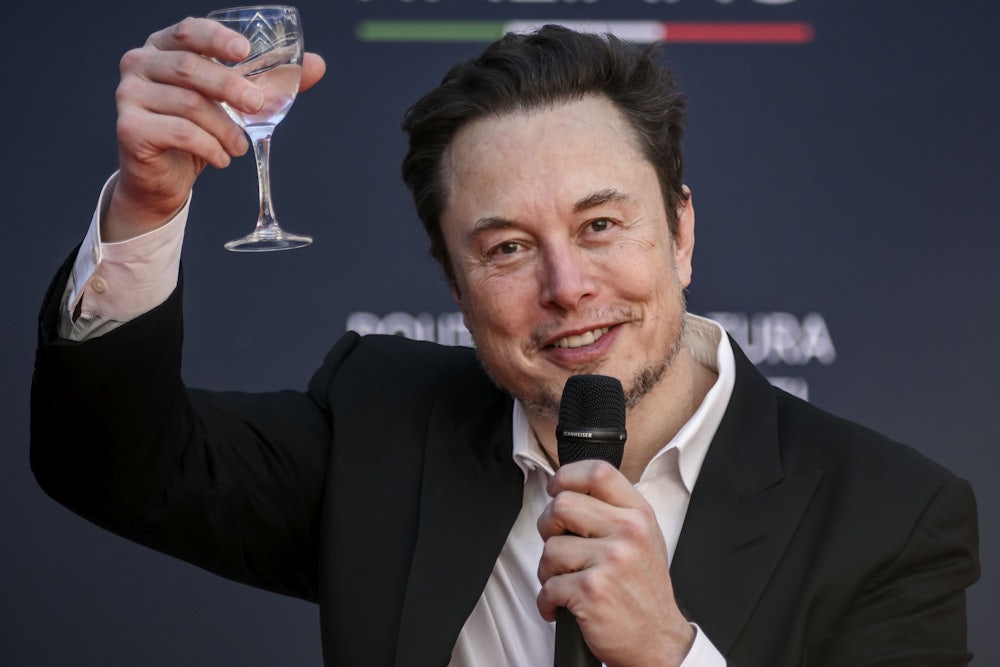 Elon Musk raises a glass as he speaks at a political convention organized by Fratelli d'Italia in Rome, Italy.