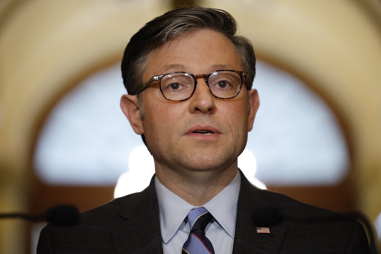 Mike Johnson stares off in space, it looks like he was caught with nothing to say