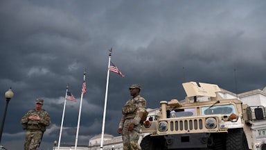 Members of the National Guard patrol outside Union Station as a storm approaches in Washington, D.C., on August 17, 2025. Donald Trump deployed military and federal law enforcement, ostensibly to curb violent crime in the nation’s capital.