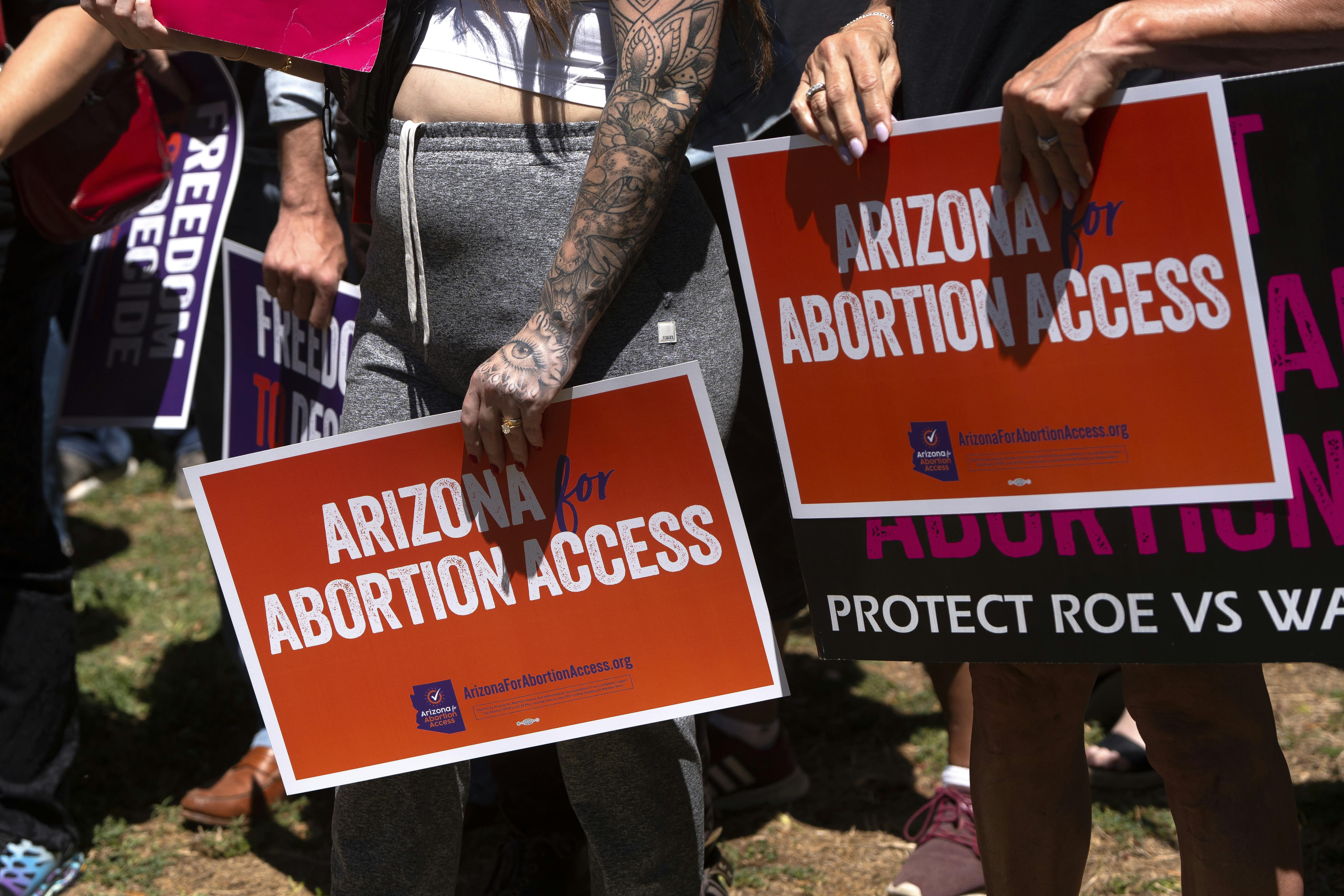Members of Arizona for Abortion Access, the ballot initiative to enshrine abortion rights in the Arizona State Constitution, hold a press conference on April 17, 2024 in Phoenix, Arizona. 