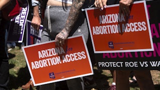 Members of Arizona for Abortion Access, the ballot initiative to enshrine abortion rights in the Arizona State Constitution, hold a press conference on April 17, 2024 in Phoenix, Arizona.
