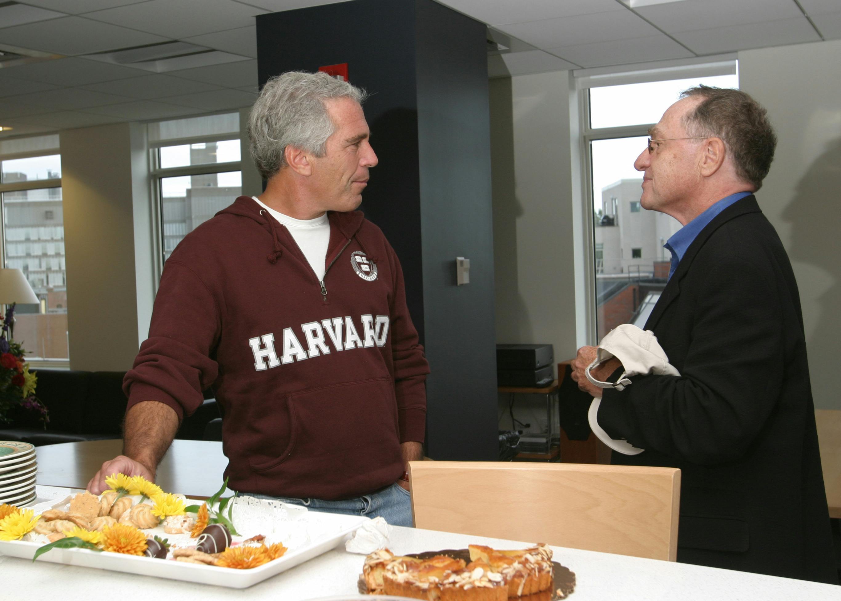 Jeffrey Epstein in conversation with Alan Dershowitz.
