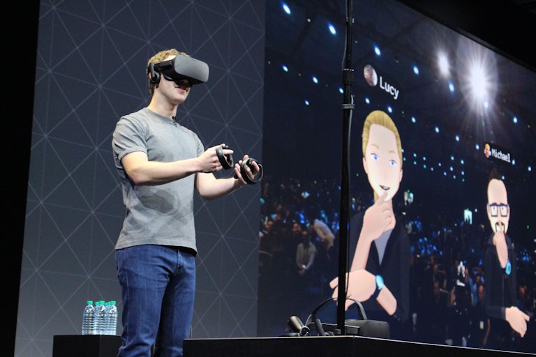 Mark Zuckerberg wearing oculus rift headset
