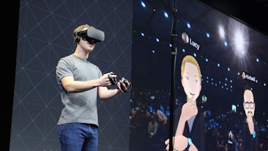 Mark Zuckerberg wearing oculus rift headset