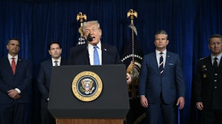 Trump speaks at the presidential podium while CIA Director John Ratcliffe, Secretary of State Marco Rubio, Defense Secretary Pete Hegseth, and Chairman of the Joint Chiefs of Staff General Dan Caine stand behind him in a row.