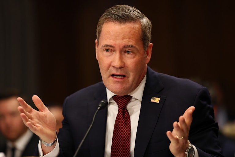 Mike Waltz gestures while speaking during his Senate confirmation hearing for UN ambassador