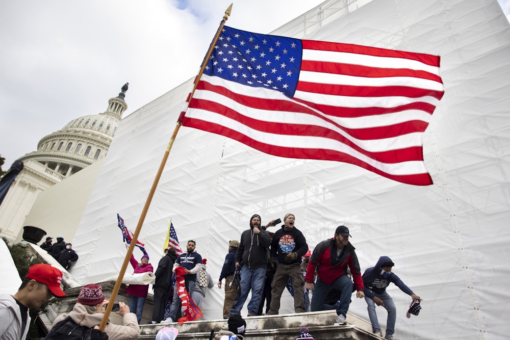 Trump supporters try to storm the US Capitol in Washington D.C on January 6, 2021.
