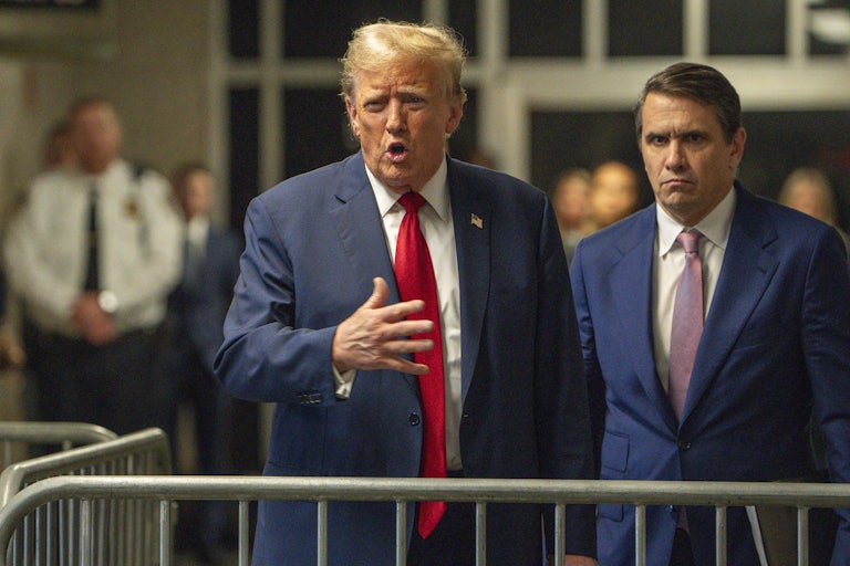 Donald Trump gestures as he speaks