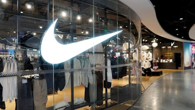 A Nike store with the giant "swoosh" logo