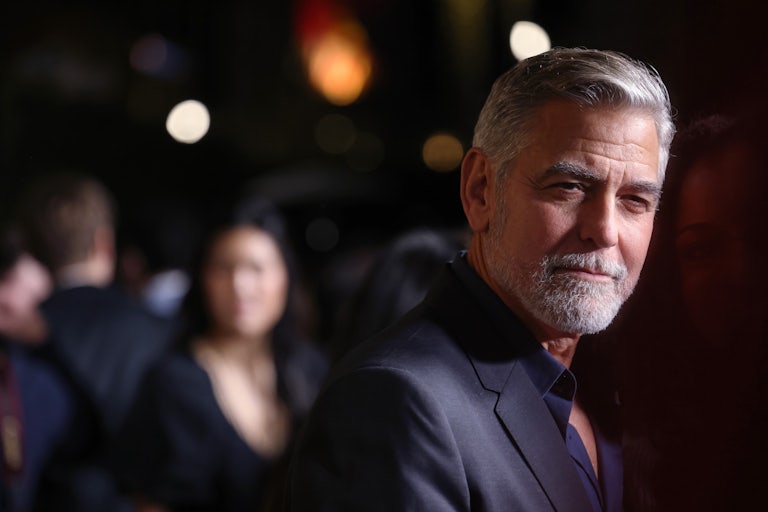 George Clooney looks to the side