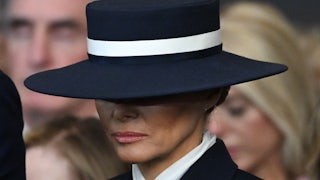 Melania Trump wears a ridiculous hat that covers her eyes during the inauguration of her husband.