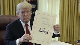 Donald Trump during the signing ceremony for his 2017 tax cut.