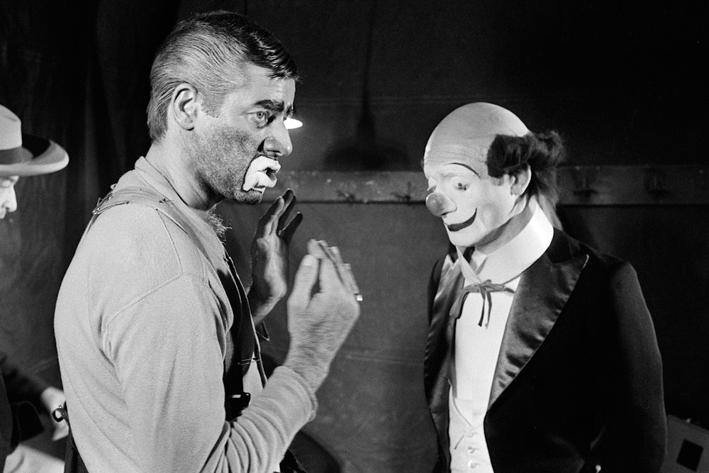 Jerry Lewis, left, talks to Pierre Etaix on March 22, 1972, during the shooting of the film "The Day the Clown Cried."