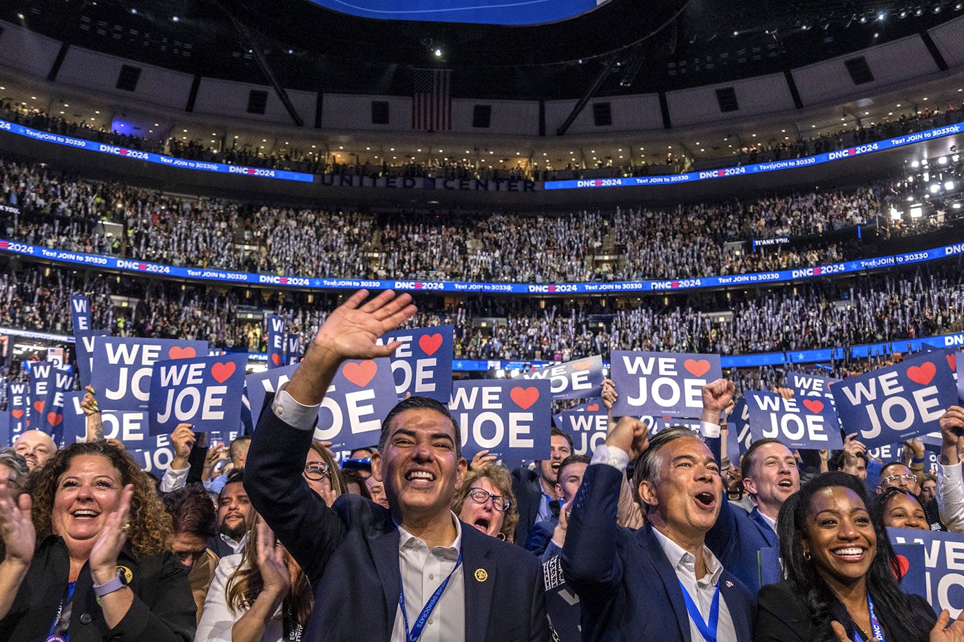 Delegates shout “We Love Joe” as U.S. President Joe Biden arrives onstage at the United Center on day one.