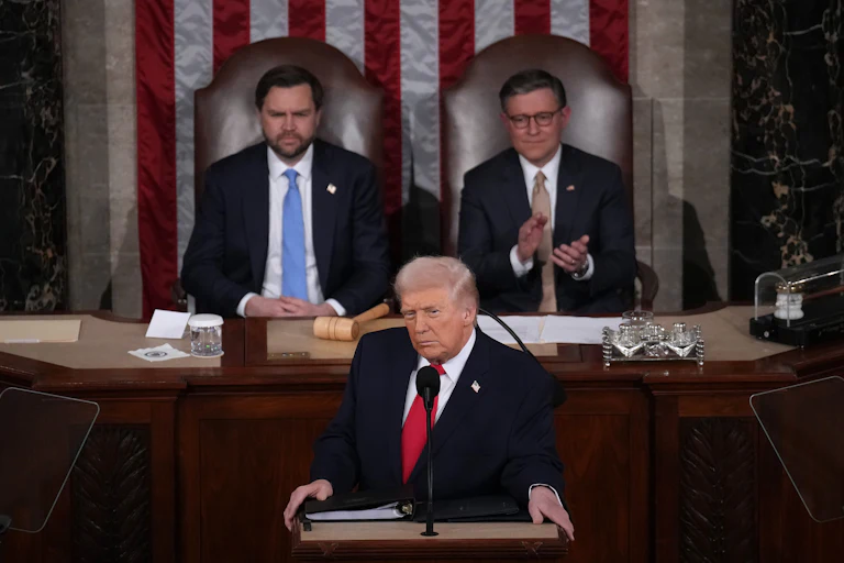President Trump delivers his State of the Union address to Congress, February 24, 2026. Vice President JD Vance and House Speaker Mike Johnson sit behind him.