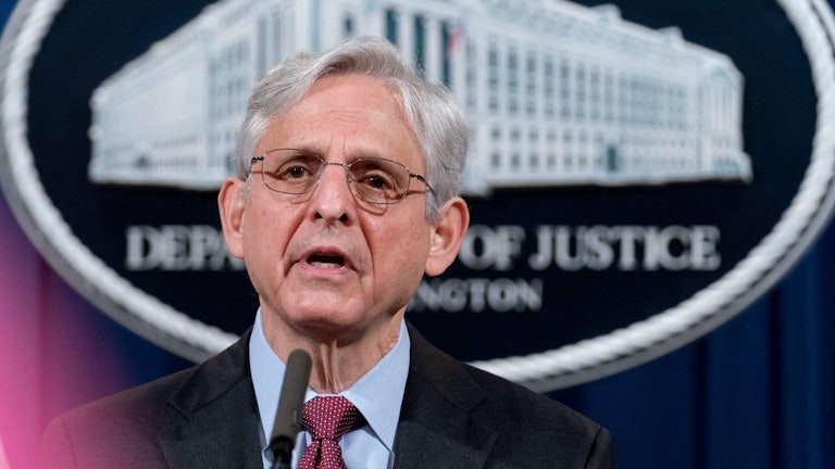 Attormey General Merrick Garland delivers a speech at the Department of Justice.