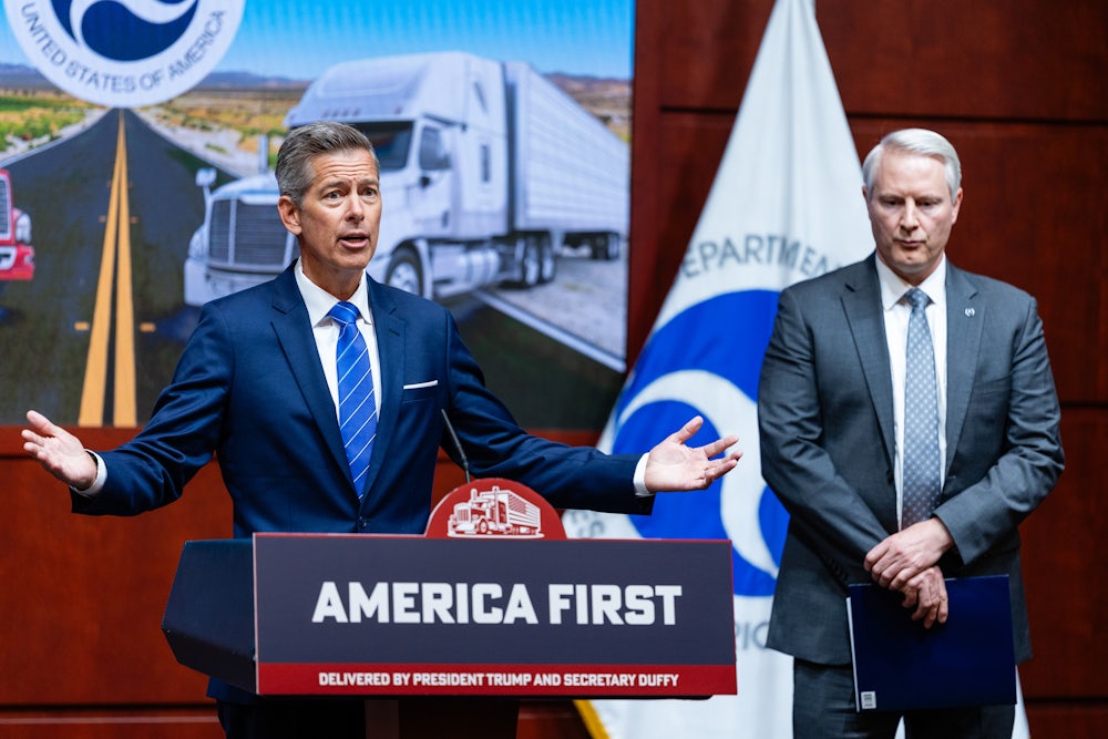 U.S. Secretary of Transportation Sean Duffy, left, and Jesse Ellison, chief counsel for the Federal Motor Carrier Safety Administration, during a news conference in Washington, D.C.