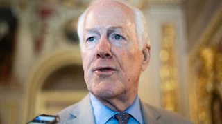 Senator John Cornyn speaks to reporters in the Capitol