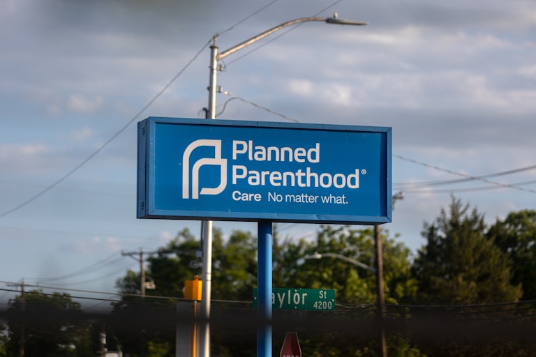 A large sign reads "Planned Parenthood Care No Matter What."