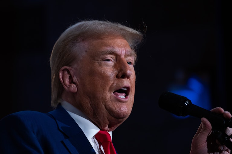 Donald Trump speaks at a mic