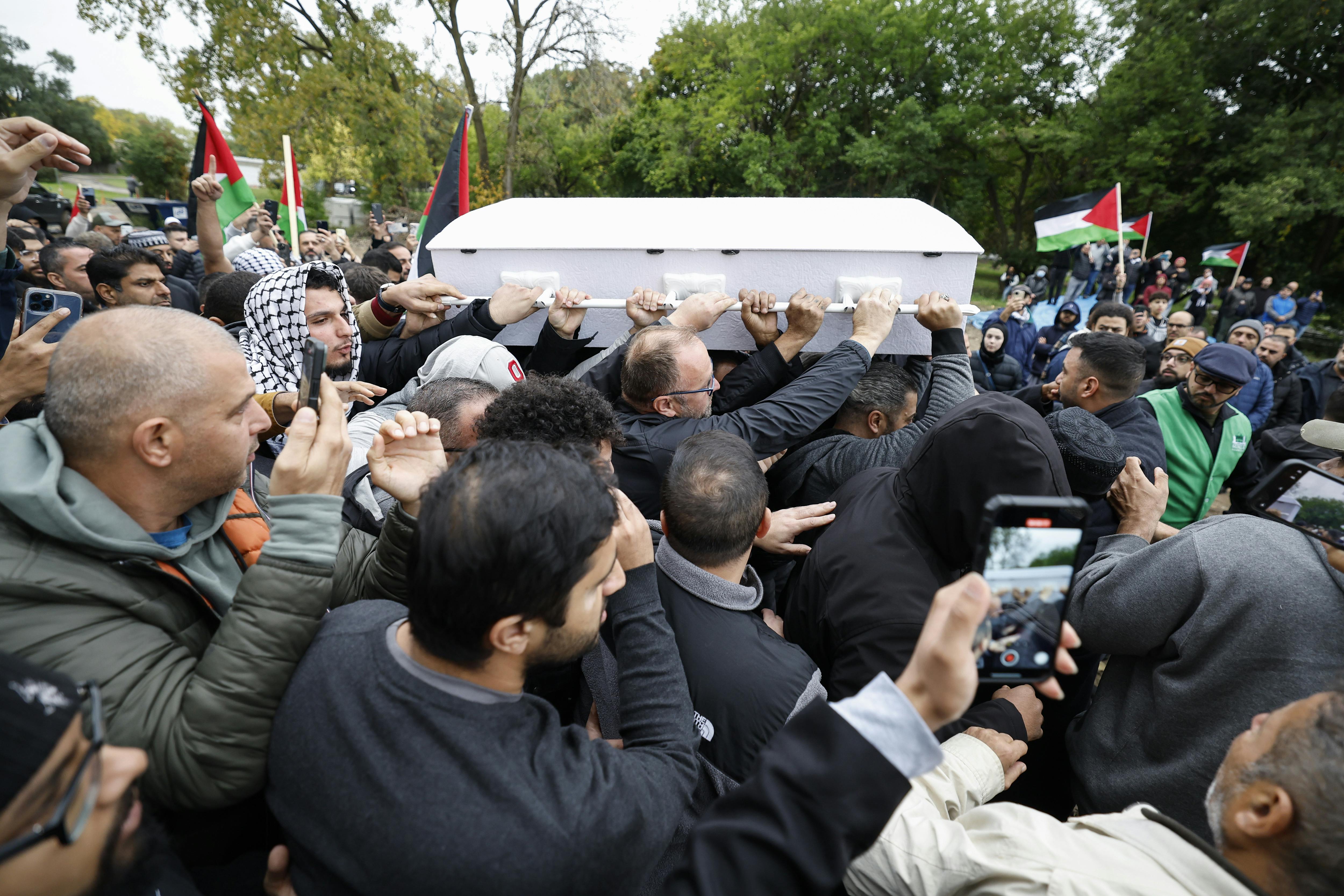 Mourners carry the coffin of six-year-old Wadea Al-Fayoume during his funeral on October 16, 2023 in LaGrange, Illinois. Wadea was stabbed to death and his mother seriously injured in an attack by the family's landlord, Joseph Czuba, who was motivated by hatred for Muslims and the fighting in Israel and Gaza.