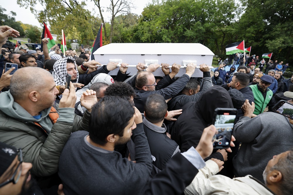 Mourners carry the coffin of six-year-old Wadea Al-Fayoume during his funeral on October 16, 2023 in LaGrange, Illinois. Wadea was stabbed to death and his mother seriously injured in an attack by the family's landlord, Joseph Czuba, who was motivated by hatred for Muslims and the fighting in Israel and Gaza.