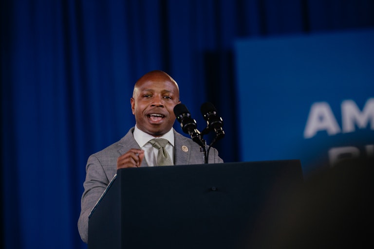 Milwaukee Mayor Cavalier Johnson speaks into microphones