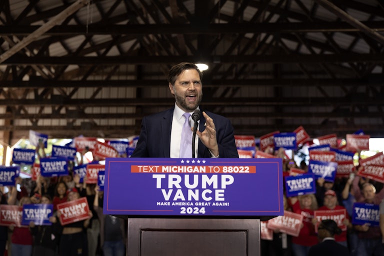 J.D. Vance smiles while talking at a Donald Trump campaign event