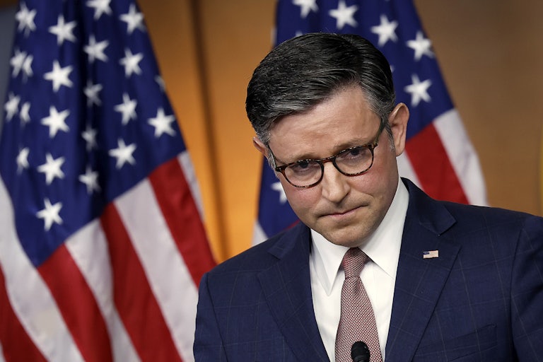 Mike Johnson looks dow