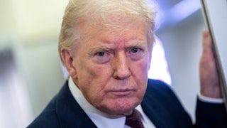 Donald Trump glares while standing