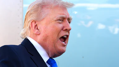 President Donald Trump spoke to reporters before boarding Air Force One at Palm Beach International Airport on March 23, 2026.