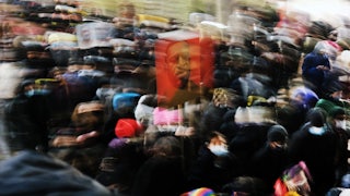 People gather in a Manhattan park to protest on the first day of the trial for the killing of George Floyd.