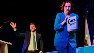 Gubernatorial candidate Katie Porter exits as fellow candidate Ian Calderon enters the stage