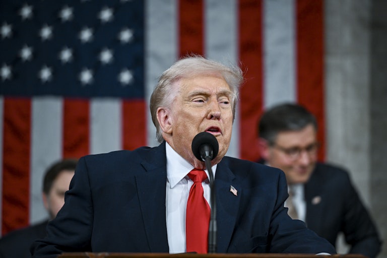 Aliya Rahman is surrounded people trying to escort her out of Tru