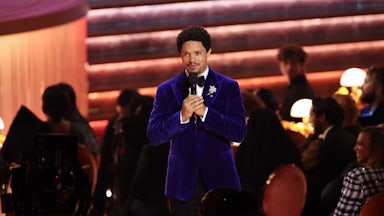 Trevor Noah speaks while hosting the Grammys