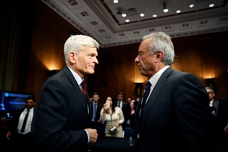 Senator Bill Cassidy and RFK Jr. look like they're about to shake hands in the Capitol