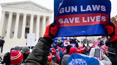 Supporters of gun control and firearm safety measures hold a protest rally outside the Supreme Court during oral arguments in State Rifle and Pistol v. City of New York, NY, on December 2, 2019.