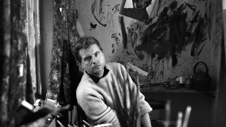 Francis Bacon in his studio at Overstrand Mansions in Battersea.
