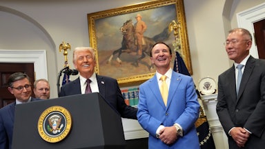 Donald Trump and Lousiana Governor Jeff Landry laugh in the Oval Office of the White House, along with others.