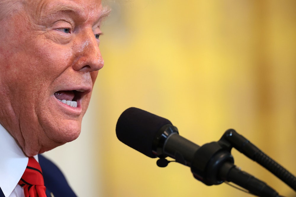 Donald Trump speaks during a reception in the East Room of the White House.