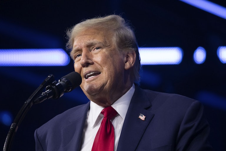 Donald Trump speaks at a mic