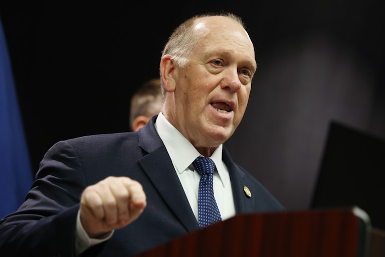 White House border czar Tom Homan speaks at a podium while making a hand gesture for emphasis