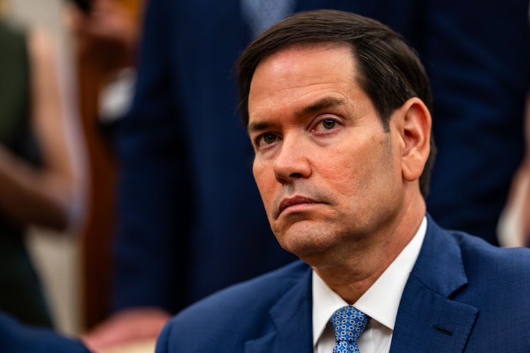 Secretary of State Marco Rubio sits in the Oval Office