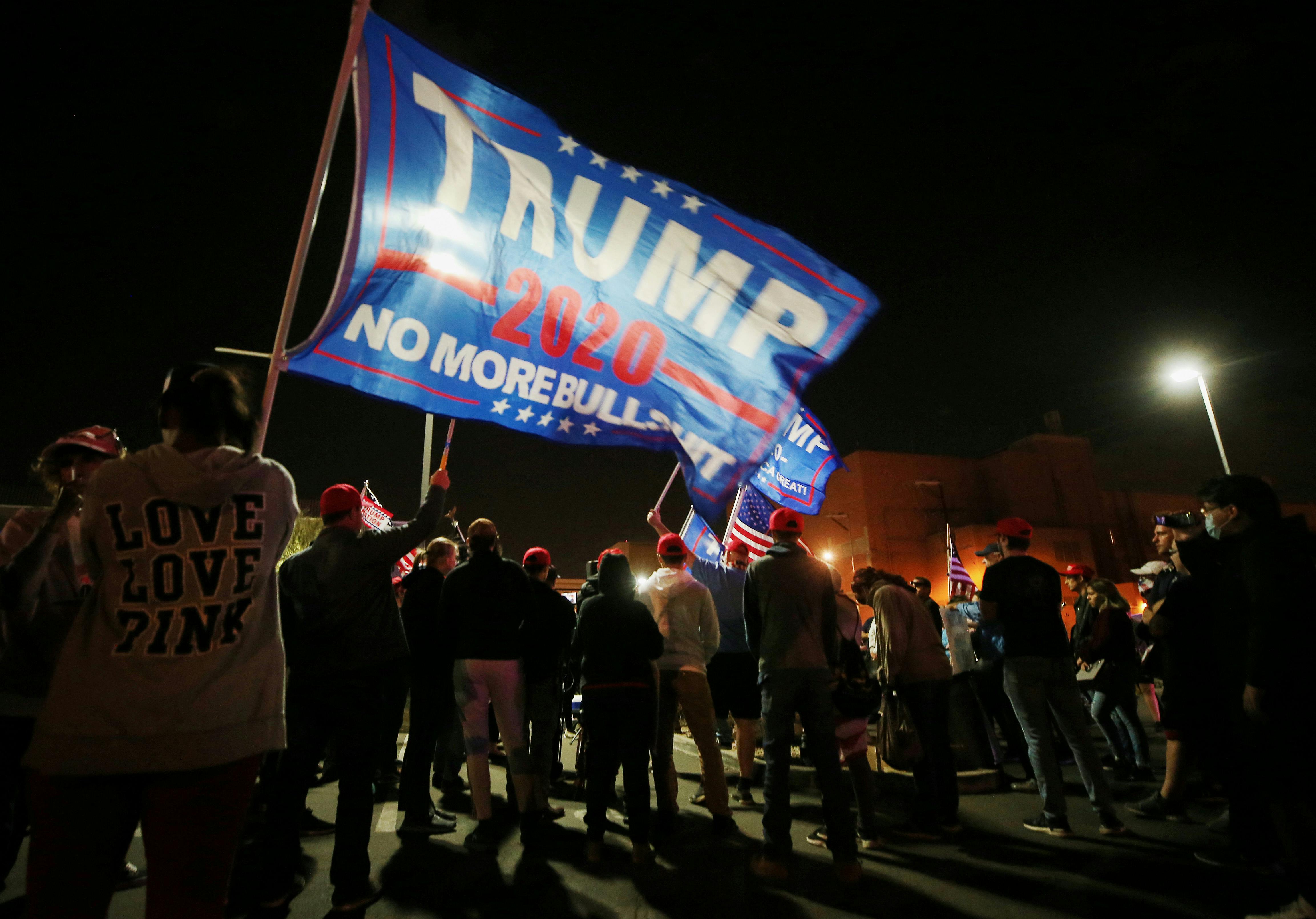 Supporters of President Donald Trump demonstrate in front of the Maricopa County Elections Department office on Election Day.