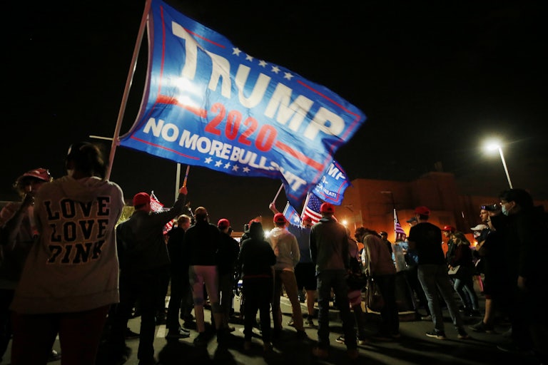 Supporters of President Donald Trump demonstrate in front of the Maricopa County Elections Department office on Election Day.